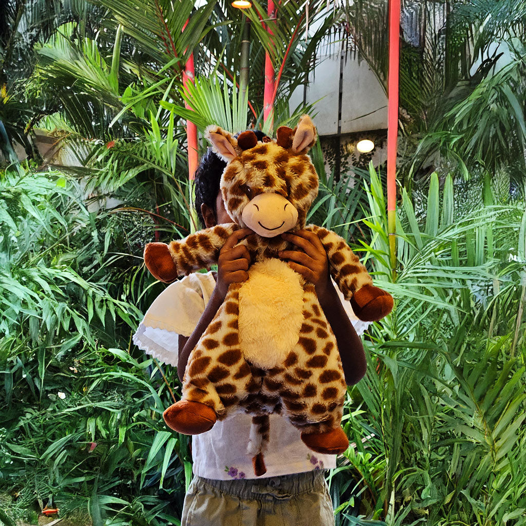 SnuggyBuggy's Jr. Raffi the Giraffe, a soft and mini plush toy with spotted brown fur, perfect for kids' cuddles and imagination.