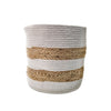 Round dual-color storage basket made of braided cotton rope and natural jute, featuring beige and white horizontal bands, used for home organization and décor.