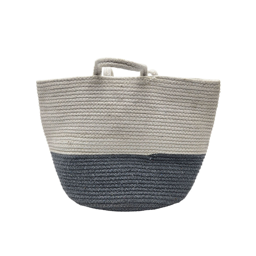 Woven basket with two-tone design on a white background