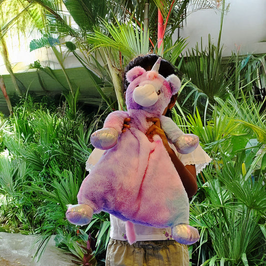 SnuggyBuggy's big Stardust the Unicorn, a soft and large plush toy with a pink and purple horn and glittery feet, perfect for kids' magical adventures.